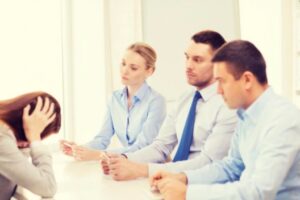 woman getting fired by panel of employers: Babcock and Associates Workers’ Compensation Blog